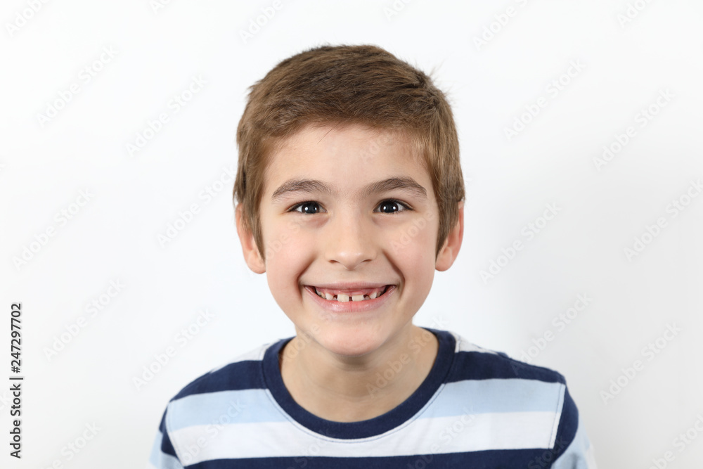 Cute Little Boy Wide Smiling Looking At Camera On White Background Close Up Cute Little Boy Wide Smiling Looking At Camera On White Background Close Up