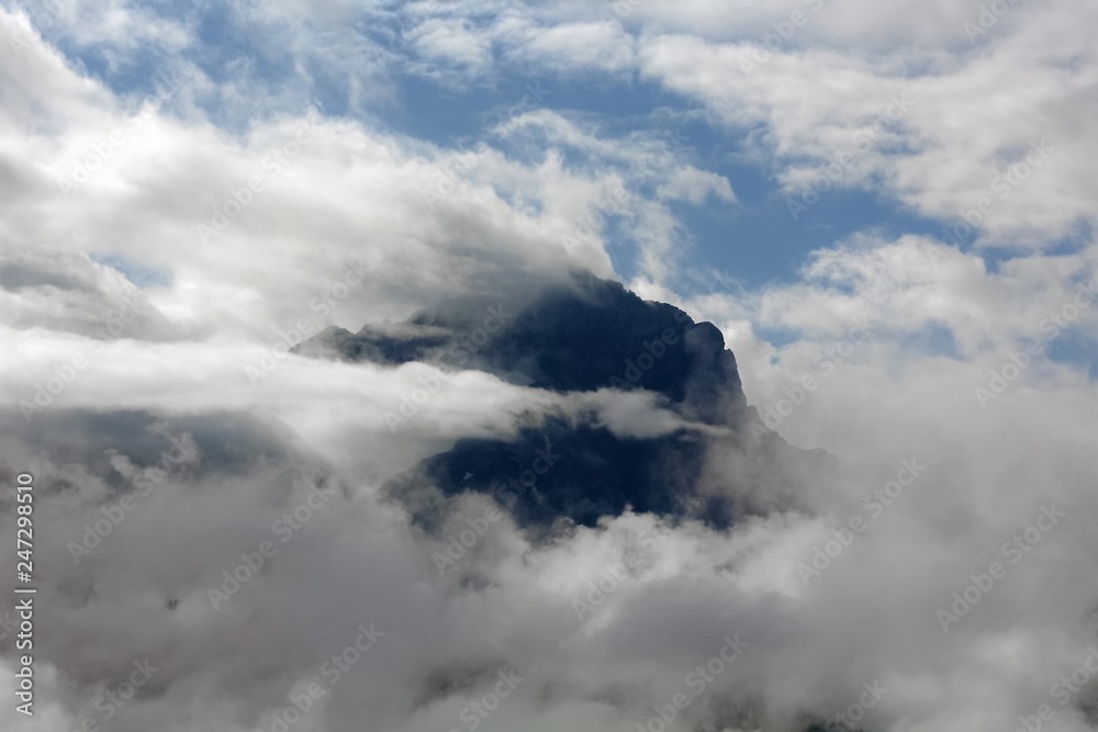 Mountain Peak And Clouds