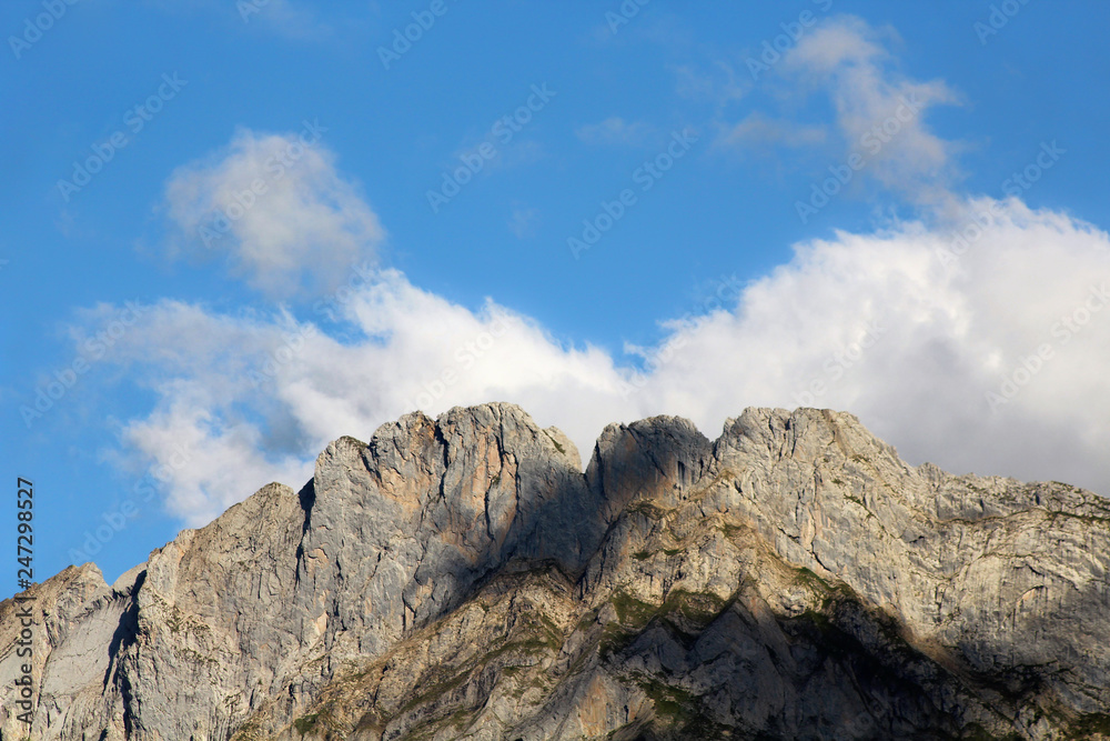 Mountain Peak And Clouds