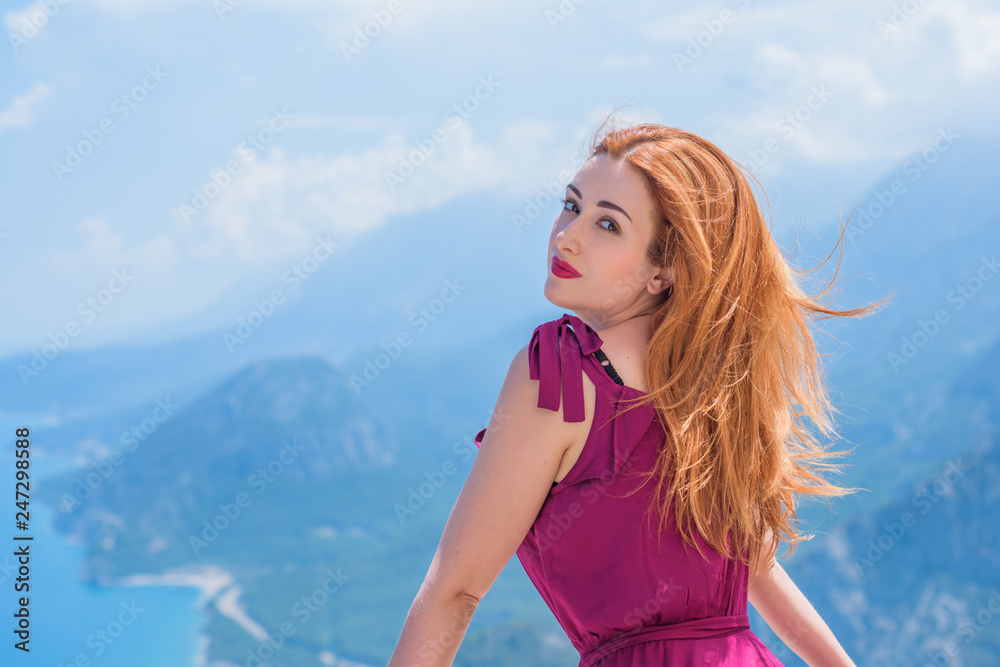Spring- summer time. Fashionable woman at vacation. Nice modern lady relaxing at warm place Spring- summer time. Fashionable woman at vacation. Nice modern lady relaxing at warm place