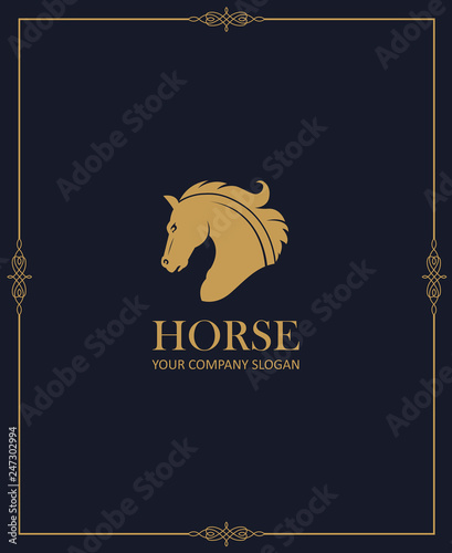 gold emblem of horse head on dark background