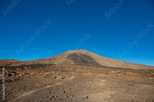 Pico viejo volcano crater against deep blue sky