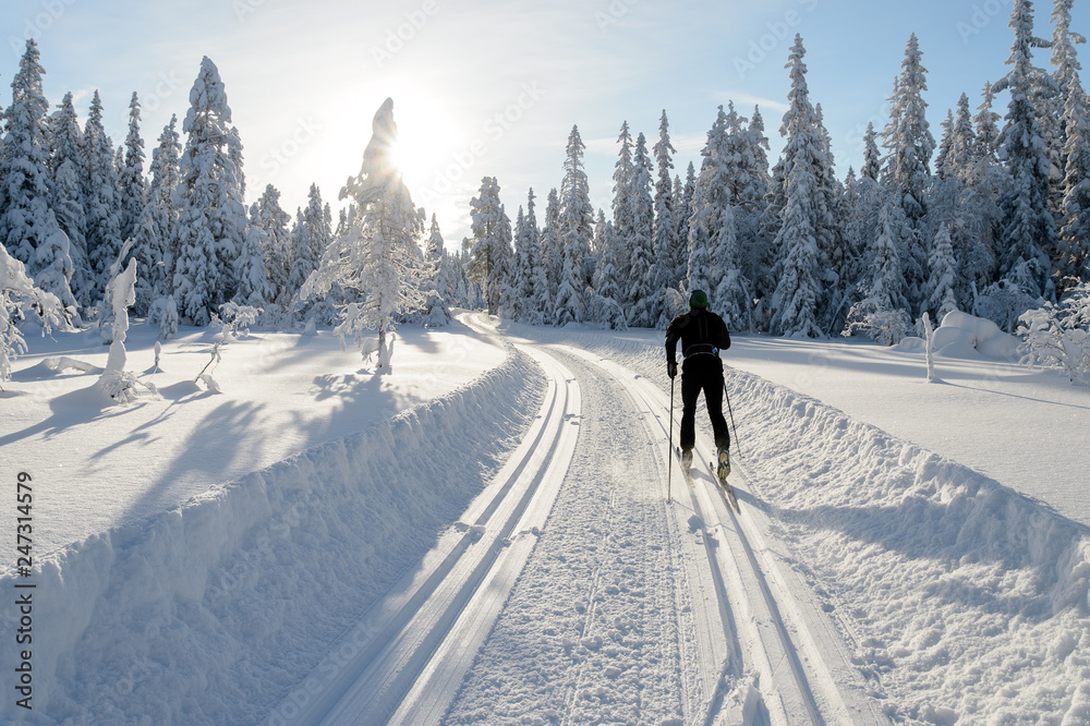 Man skiing, skislopes, winter in Norway