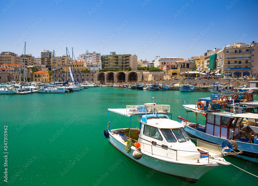 Fishing boats and Venetian Fortress in Heraklion, Crete, Greece