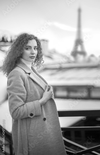 Girl in a coat in Paris.