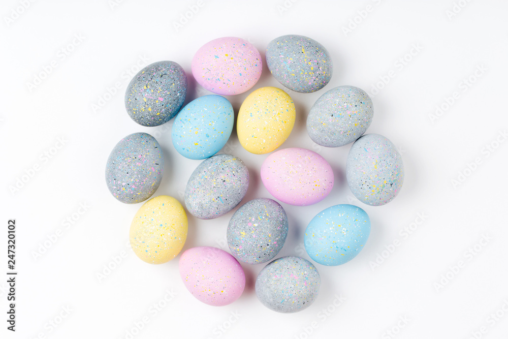 Background with pale pink, blue, yellow and gray Easter eggs. Compositions in pastel colors. Easter concept Background with pale pink, blue, yellow and gray Easter eggs. Compositions in pastel colors. Easter concept