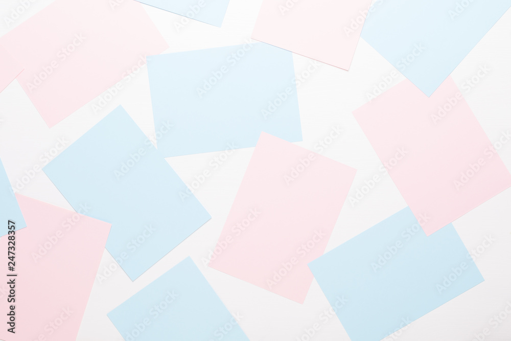 Abstract geometric background in light pastel tones from sheets of thick pale past paper. Abstract geometric background in light pastel tones from sheets of thick pale past paper.