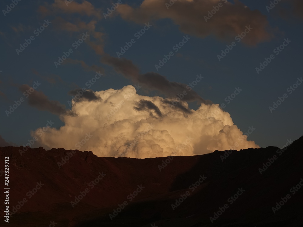 Sunset in the mountains. View from the height. Sunset in the mountains. View from the height.