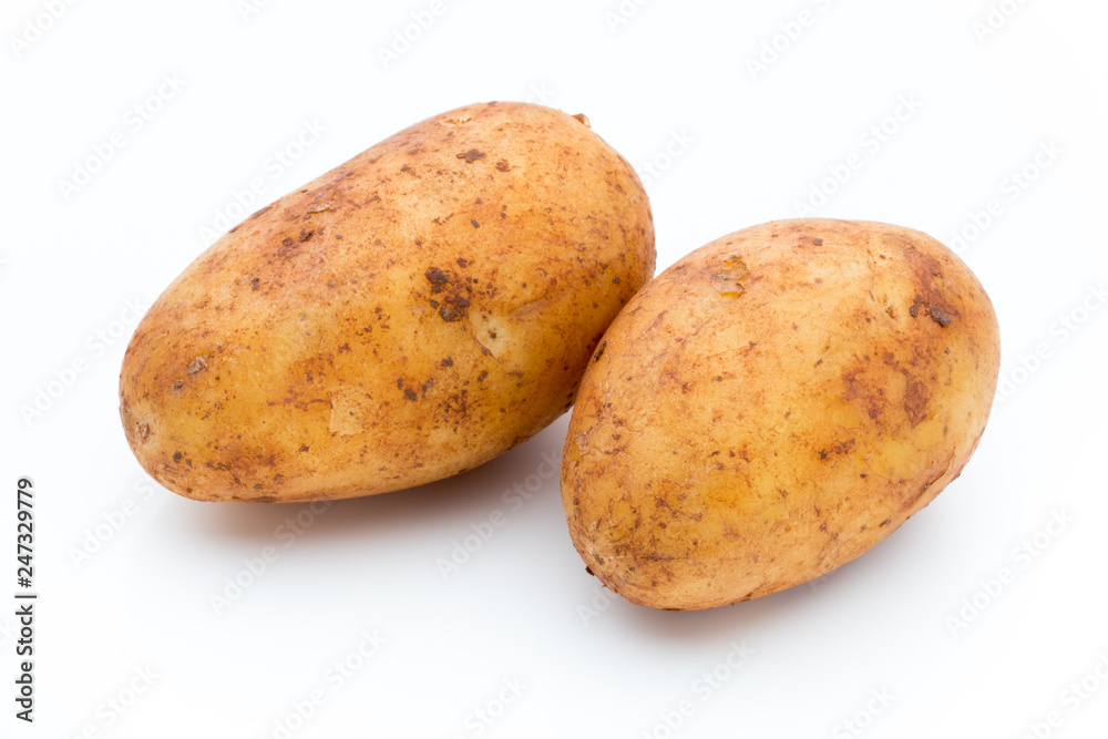 A bio russet potato isolated white background. A bio russet potato isolated white background.