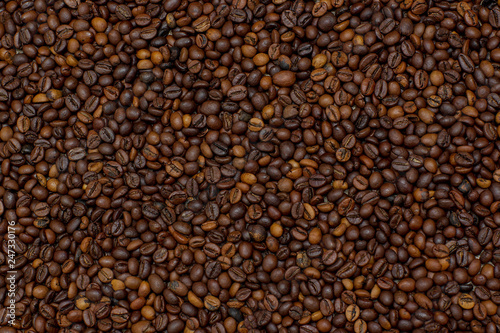 Coffee beans texture. Coffee background. Сoffee grain. Background image of many coffee beans filling the picture