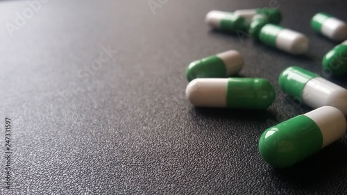 two-color treatment capsules photo