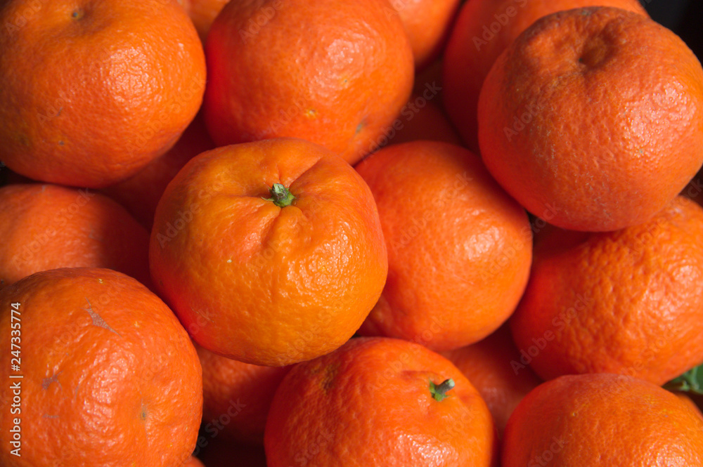 Some ripe oranges in a drawer Some ripe oranges in a drawer