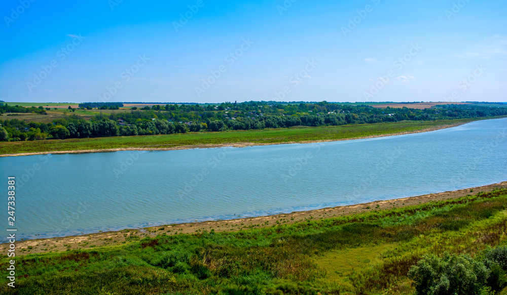 Photo of big river in Khotyn, view from beach