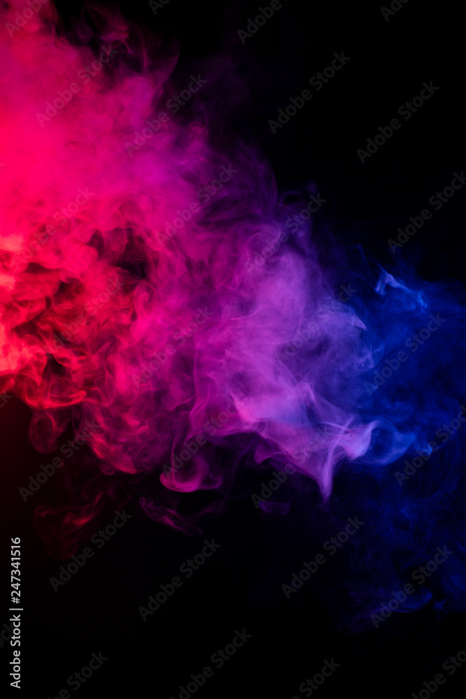 Colourful cloud of vapor. dark black background