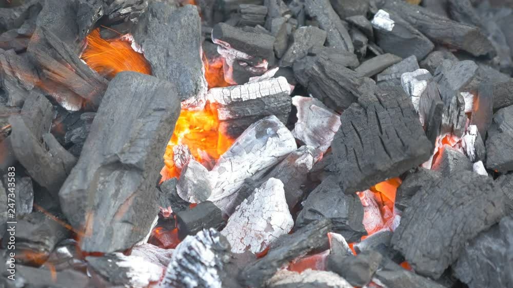 Burning fire and hot coals. Heat of flame coming from the fire, 4k close-up log footage Burning fire and hot coals. Heat of flame coming from the fire, 4k close-up log footage