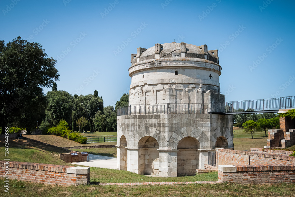 Obraz premium Mausoleum of Theodoric the Great in Ravenna, Italy against clear blue sky and greenery