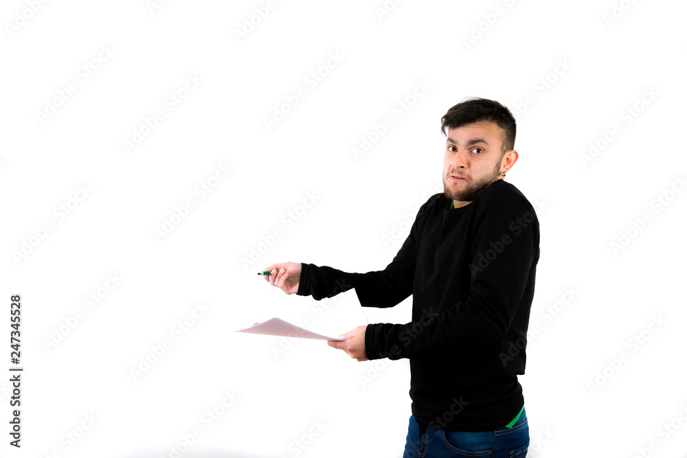 Confused and surprised bearded young man nice and modern holding some documents and pen isolated on a white background Confused and surprised bearded young man nice and modern holding some documents and pen isolated on a white background