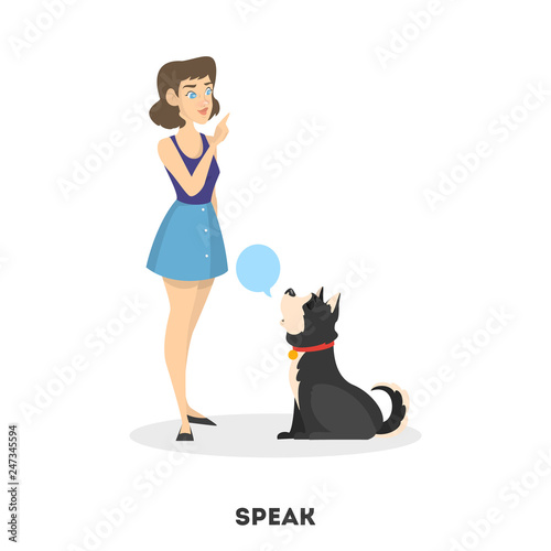 Woman training her pet dog. Speak command