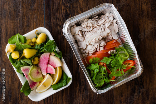 Package of Turkish Offal Food Lamb Brain with Pickles and Salad / Beyin Sogus in Plastic Box Container. photo