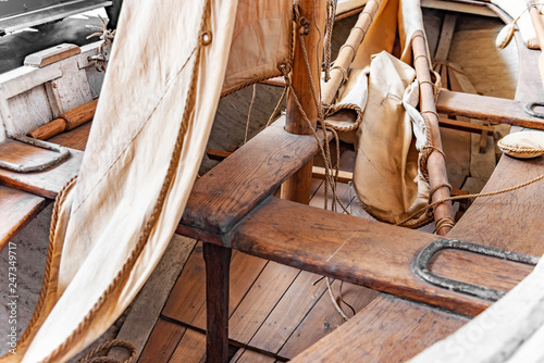 Sailing rowing wooden fishing boat. Inside view.