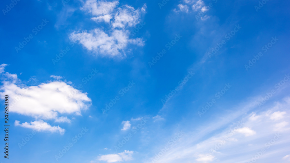 Clouds on a blue sky as background