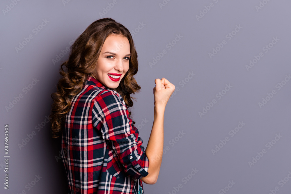 Profile side view portrait of her she nice cute attractive lovely magnificent well-groomed charming pretty cheerful wavy-haired lady showing winning gesture isolated over gray pastel background Profile side view portrait of her she nice cute attractive lovely magnificent well-groomed charming pretty cheerful wavy-haired lady showing winning gesture isolated over gray pastel background
