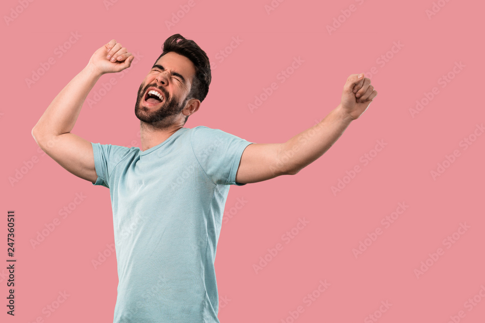 young man celebrating and dancing young man celebrating and dancing