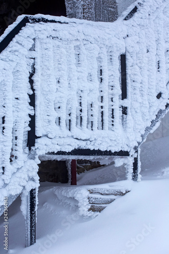 Frozen railing at the Dochia cabane photo