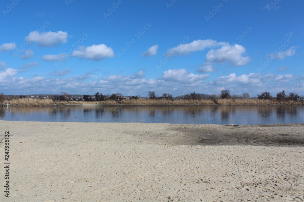 view of beach with blue sky and clouds view of beach with blue sky and clouds