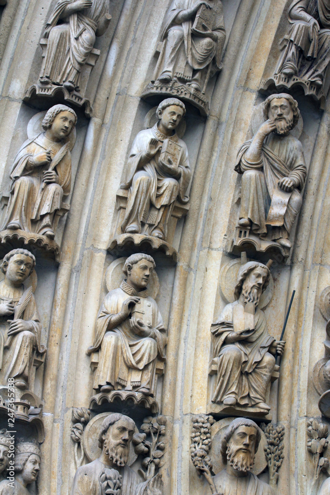 Paris, Notre-Dame cathedral, portal of the Virgin, the archivolts are populated by the Heavenly Court (angels, patriarchs, kings, and prophets).