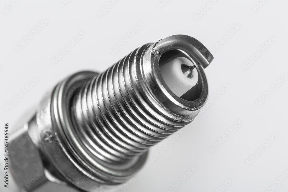 spark plugs on white background, shallow depth of field spark plugs on white background, shallow depth of field