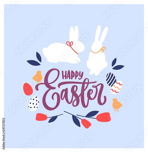 Beautiful decorative composition with Happy Easter wish handwritten with eleg...