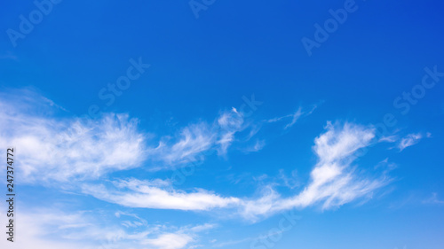 Clouds on a blue sky as background