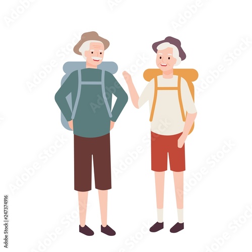 Elderly couple with backpacks