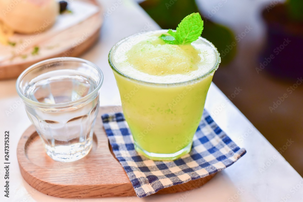 Healthy Apple and Lime Detox Juice Isolated on a Table Healthy Apple and Lime Detox Juice Isolated on a Table