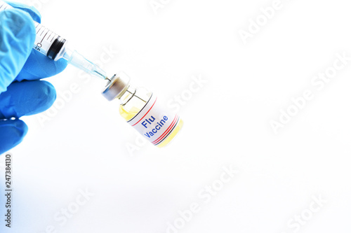 Bottle of Flu vaccine for injection, protective vaccine for influenza virus
 photo