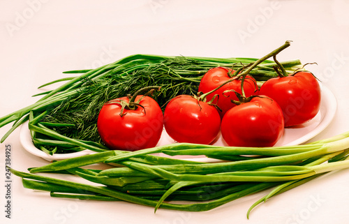 red tomato with greens 