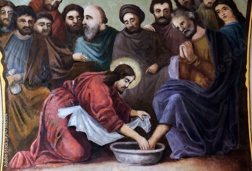 Jesus washes the feet of Peter, fresco in the church of Saint Matthew in Stitar, Croatia  photo