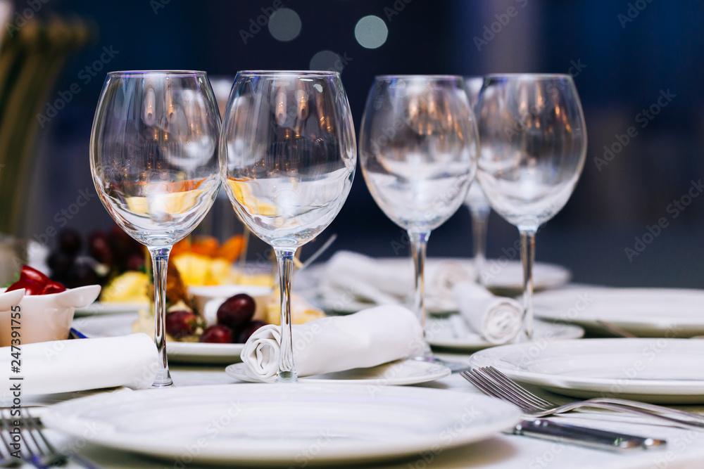 Beautifull glasses on table light white background. Party with red and white wine and holiday celebration concept. Beautifull glasses on table light white background. Party with red and white wine and holiday celebration concept.