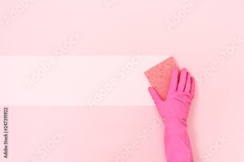 Woman holding small soft sponge for washing in her hands photo