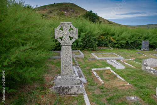 Celtic Cross in the churchyard of Saint Enodoc Church east of Daymer Bay and near the Village of Trebetherick in Cornwall photo