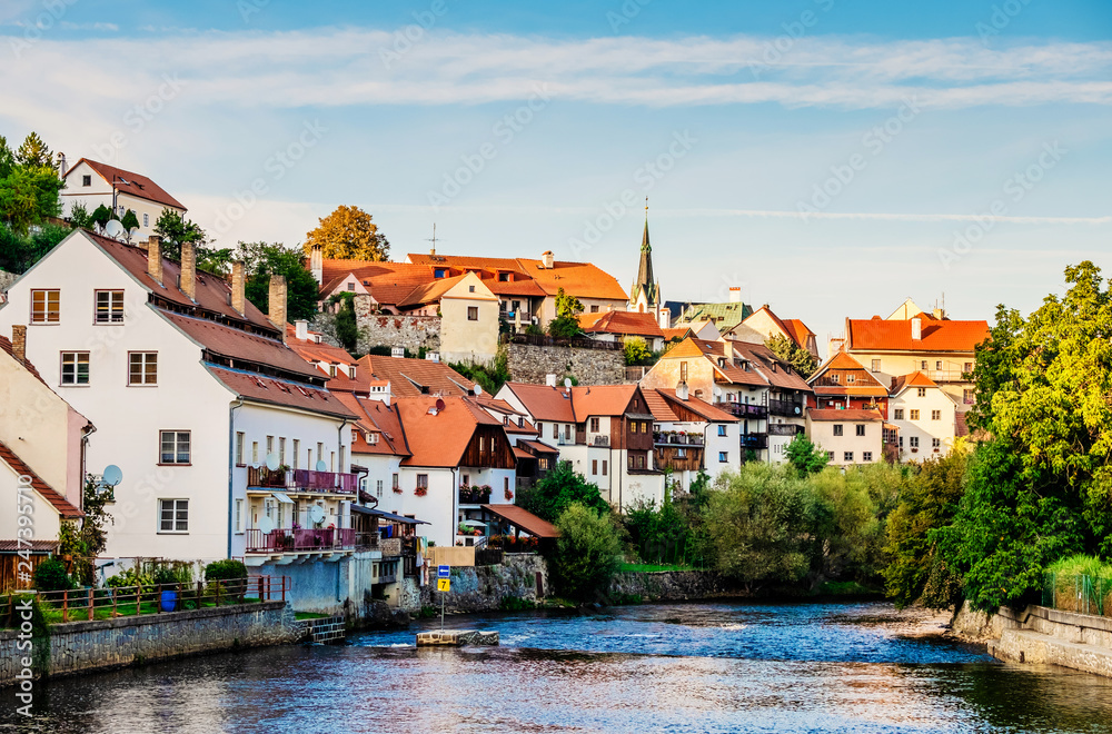 Evening sunlight view of beautiful architecture of river and Cesky Krumlov city