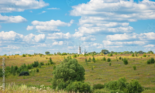 Summer Russian landscape with a temple