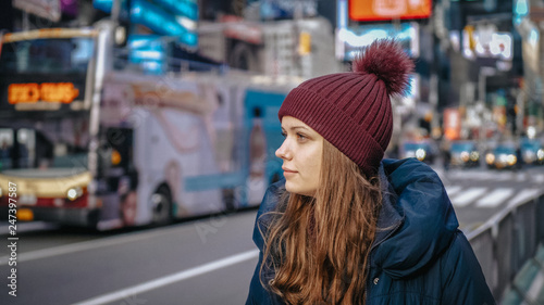 Young beautiful woman in the streets of New York for sightseeing