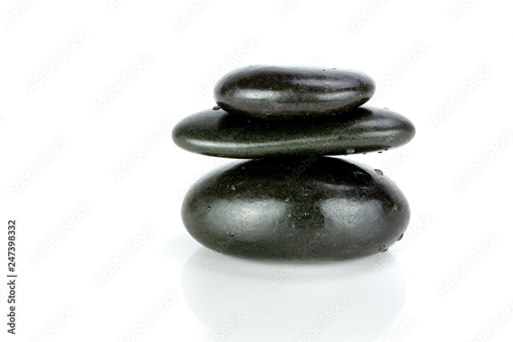 Stack of black pebbles on white background Stack of black pebbles on white background