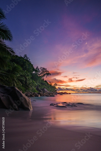 Picturesque red sky after sunset on paradise Beach on the seychelles 4