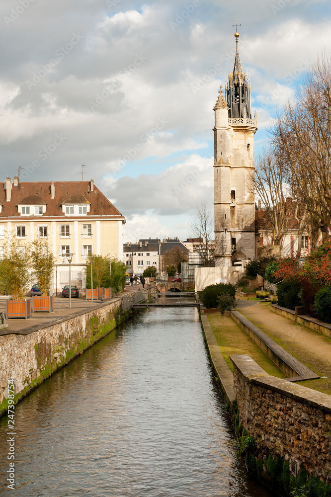 River Iton running through Evreux, Normandy, with medieval Belfry built in XV century, France