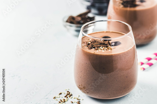 Chocolate frozen cherry chia seeds smoothie. Selective focus, space for text.