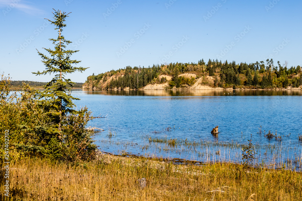 Blue water and blue skies above Glennifer Lakes Provincial Recreation Area, Alberta, Canada