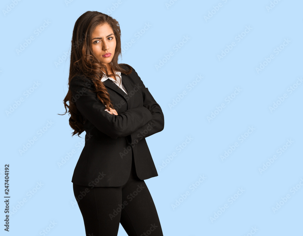Full body young busines woman looking straight ahead